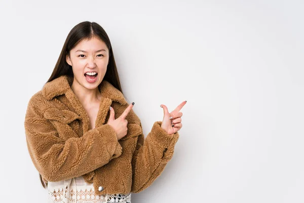 Young Chinese Woman Posing White Background Isolated Pointing Forefingers Copy — 스톡 사진