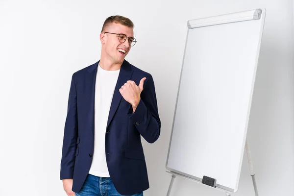 Young Coaching Man Showing White Board Points Thumb Finger Away — Stock Photo, Image