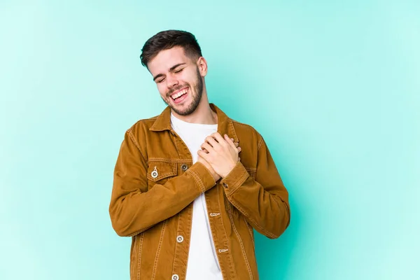 Mladý Pohledný Muž Smějící Držící Srdce Koncept Štěstí — Stock fotografie