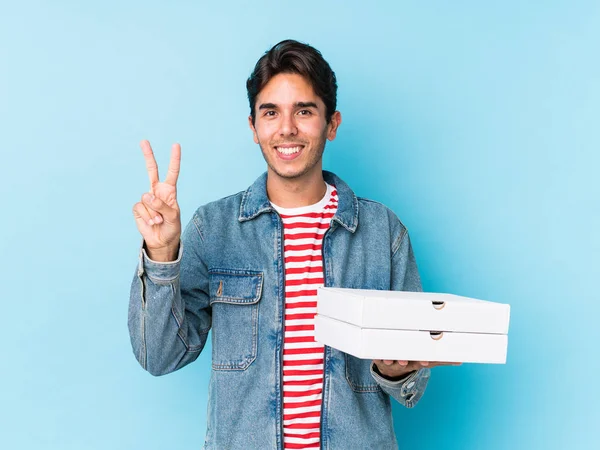 Young Caucasian Man Holding Pizzas Isolated Showing Number Two Fingers — 스톡 사진
