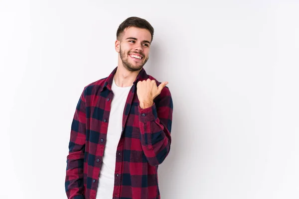 Young Caucasian Man Posing White Background Isolated Points Thumb Finger — Stock Photo, Image