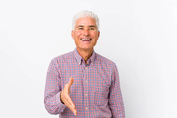 Senior Caucasian Man Isolated Stretching Hand Camera Greeting Gesture — Stock Photo, Image
