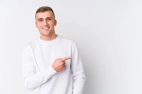 Young Caucasian Man White Background Smiling Pointing Aside Showing Something — 스톡 사진