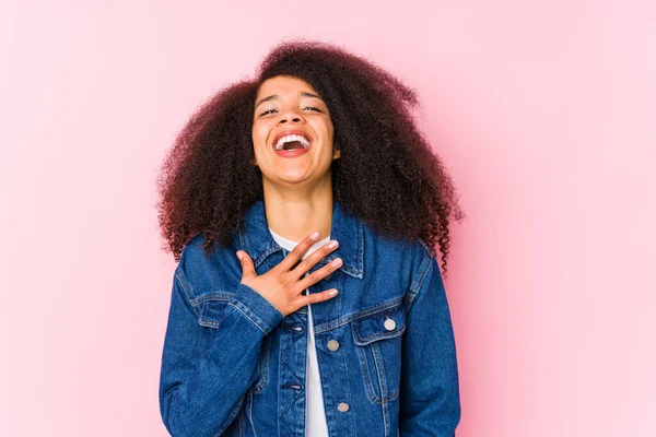 Young African American Woman Laughs Out Loudly Keeping Hand Chest — Stock Photo, Image