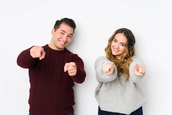 Young Couple Posing White Background Cheerful Smiles Pointing Front — 스톡 사진