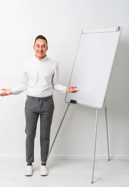 Young Latin Coaching Man Whiteboard Isolated Showing Welcome Expression — Stock Photo, Image