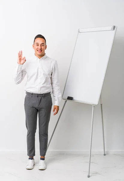 Young Latin Coaching Man Whiteboard Isolated Cheerful Confident Showing Gesture — Stock Photo, Image