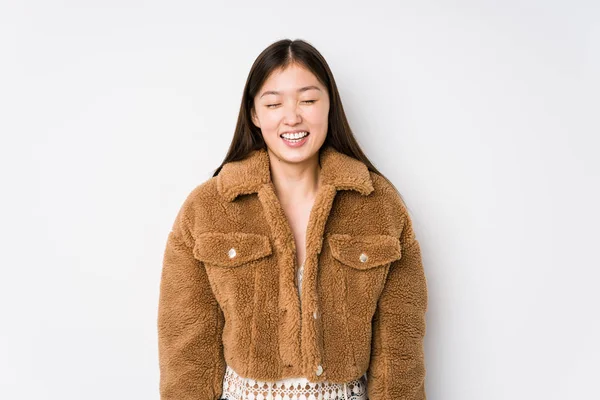 Young Chinese Woman Posing White Background Isolated Laughs Closes Eyes — 스톡 사진