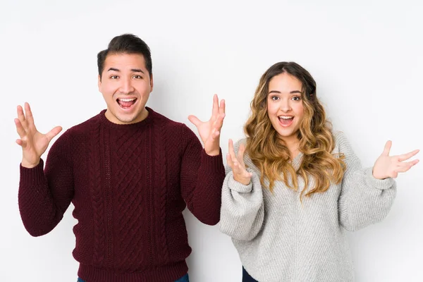 Young Couple Posing White Background Receiving Pleasant Surprise Excited Raising — 스톡 사진