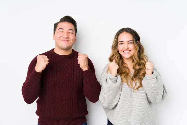 Young Couple Posing White Background Raising Fist Feeling Happy Successful — 스톡 사진