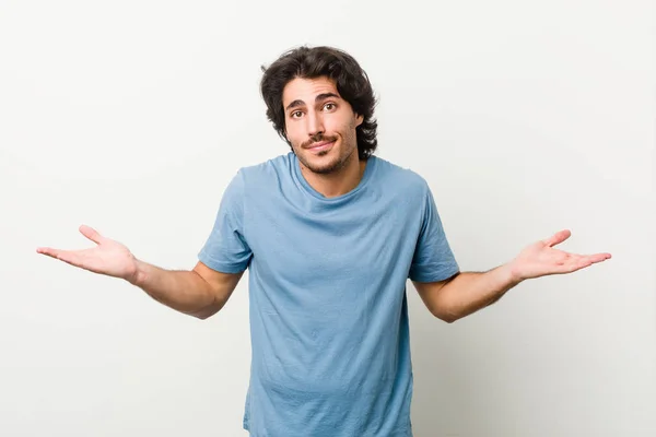 Young Handsome Man White Background Doubting Shrugging Shoulders Questioning Gesture — Stock Photo, Image