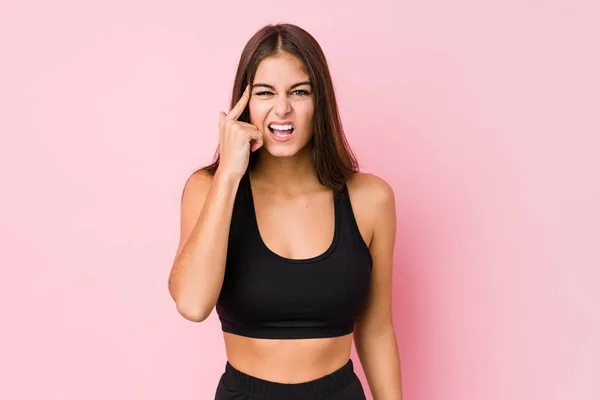 Jonge Kaukasische Fitness Vrouw Doen Sport Geïsoleerd Tonen Een Teleurstelling — Stockfoto