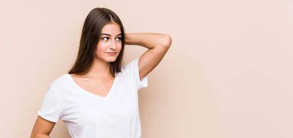 Young Caucasian Woman Posing Isolated Touching Back Head Thinking Making — Stock Photo, Image