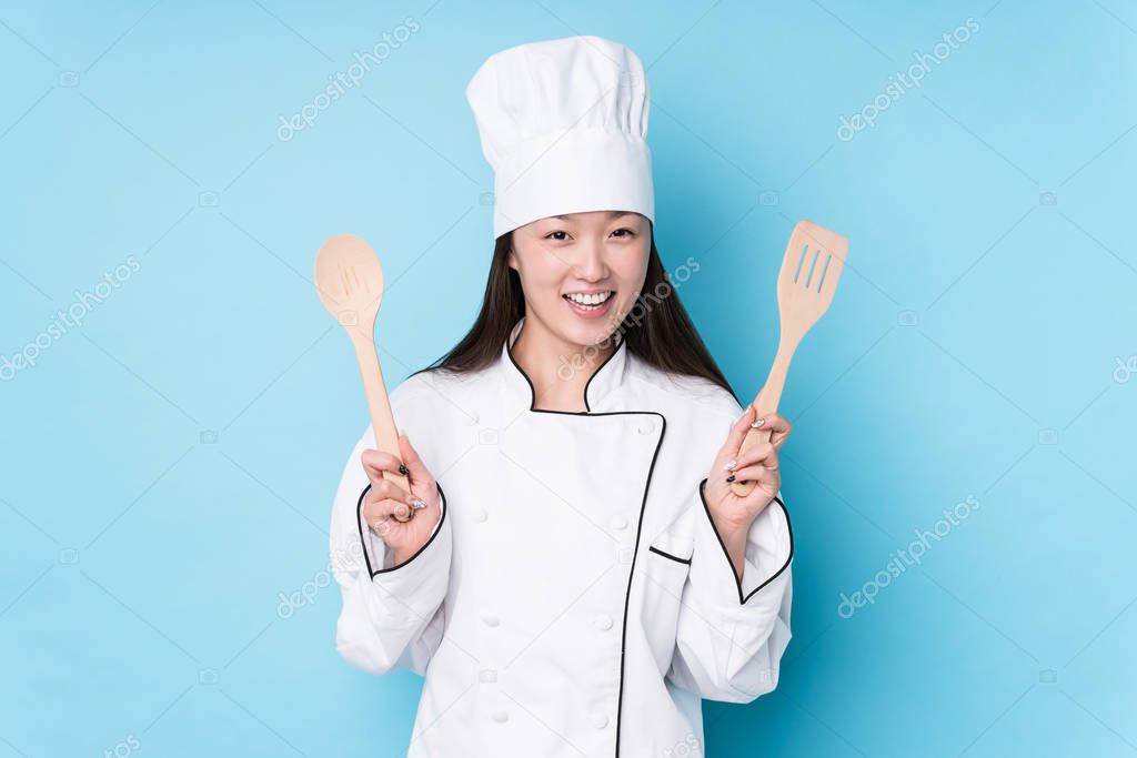 Young japanese chef woman cooking