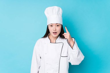 Genç Çinli aşçı kadının bir fikri, ilham konsepti var..