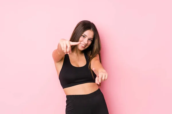 Young Fitness Caucasian Woman Isolated Cheerful Smiles Pointing Front — Stock Photo, Image