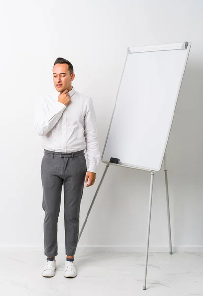 Young Latin Coaching Man Whiteboard Isolated Suffers Pain Throat Due — Stock Photo, Image