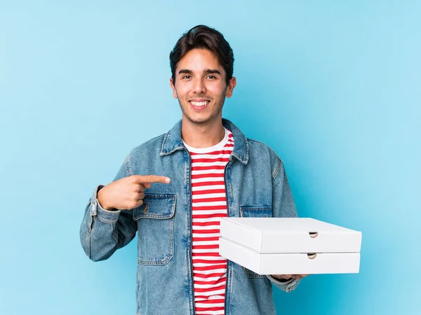 Young Caucasian Man Holding Pizzas Isolated Person Pointing Hand Shirt — 스톡 사진