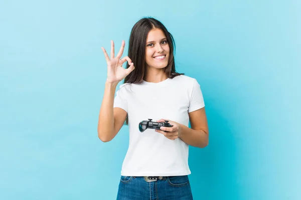 Young Caucasian Woman Holding Game Controller Cheerful Confident Showing Gesture — 스톡 사진
