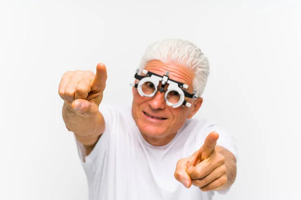 Senior Caucasian Man Wearing Optometrist Trial Frame Cheerful Smiles Pointing — ストック写真