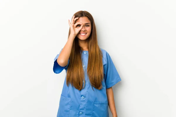 Young Caucasian Nurse Woman Excited Keeping Gesture Eye — Stok fotoğraf