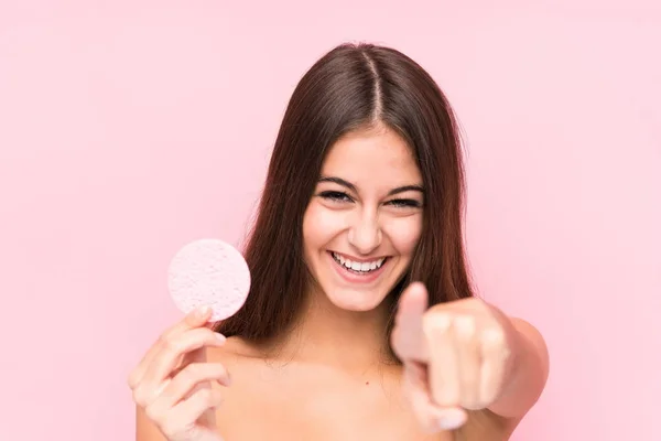 Young Caucasian Woman Holding Facial Disk Isolated Cheerful Smiles Pointing — 图库照片