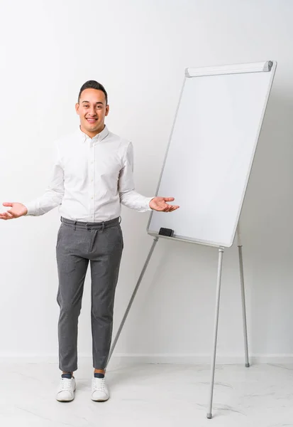 Young Latin Coaching Man Whiteboard Isolated Showing Welcome Expression — Stock Photo, Image