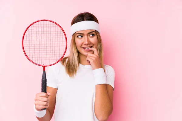 Young Woman Playing Badminton Isolated Relaxed Thinking Something Looking Copy — ストック写真