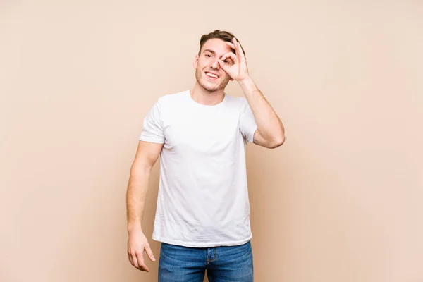 Young Caucasian Man Posing Isolated Excited Keeping Gesture Eye — 스톡 사진