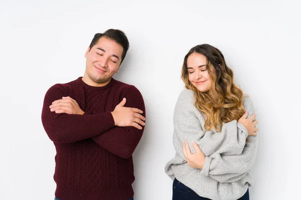 Young Couple Posing White Background Hugs Smiling Carefree Happy — 스톡 사진