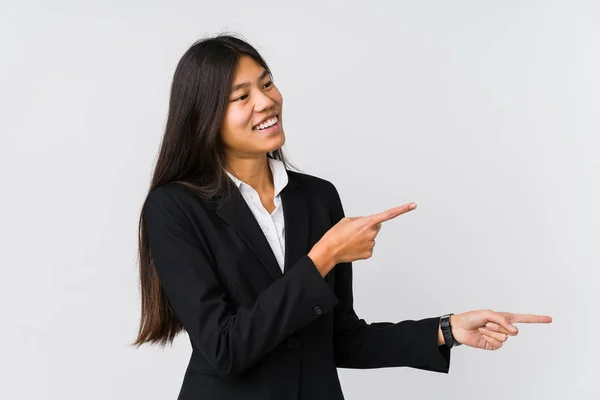 Young Asian Business Woman Excited Pointing Forefingers Away — ストック写真