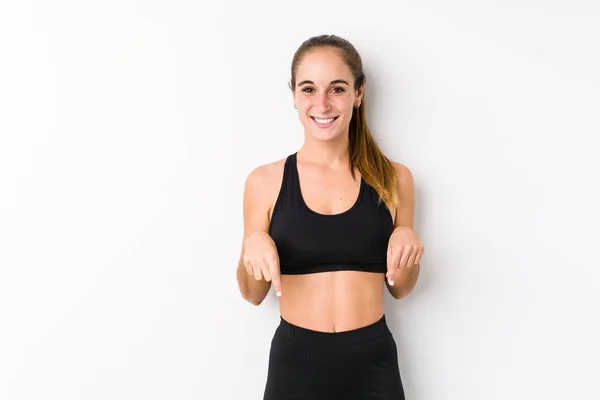 Young Caucasian Fitness Woman Posing White Background Points Fingers Positive — 스톡 사진