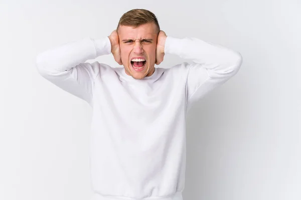 Young Caucasian Man White Background Covering Ears Hands Trying Hear — ストック写真