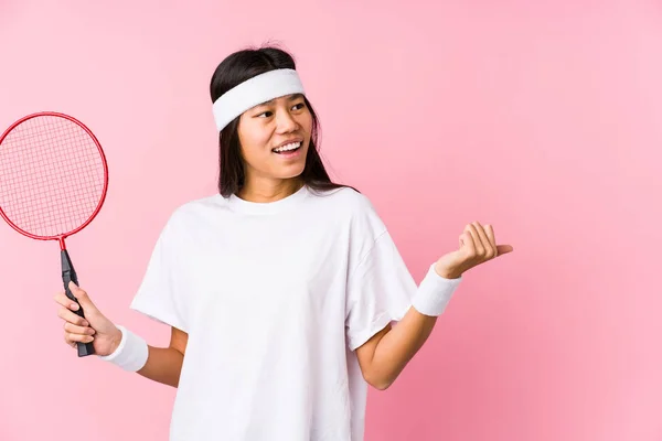 Young Chinese Woman Playing Badminton Pink Background Points Thumb Finger — ストック写真