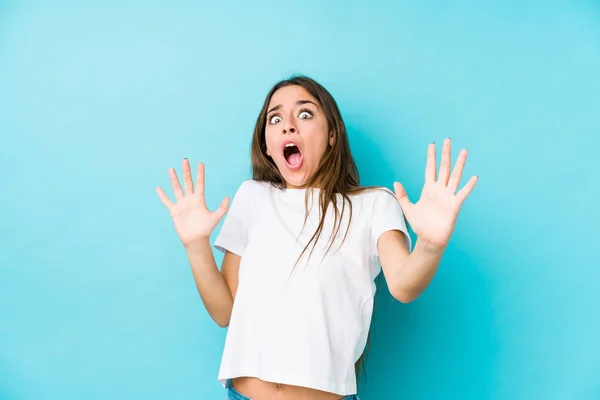 Young Caucasian Woman Isolated Being Shocked Due Imminent Danger — Stock Photo, Image