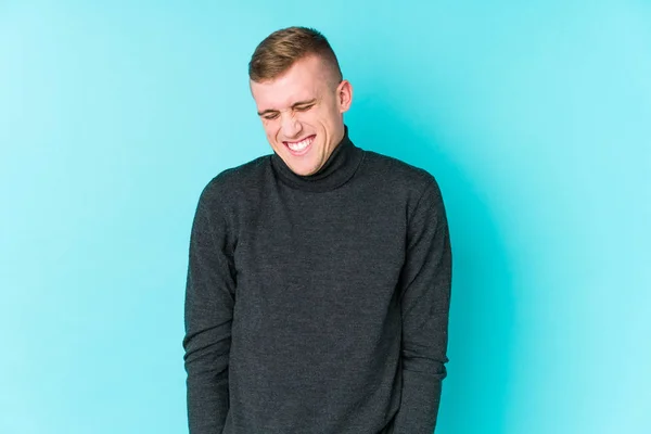 Young Caucasian Man Blue Background Laughs Closes Eyes Feels Relaxed — Stock Photo, Image