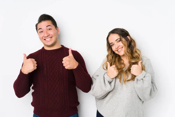 Young Couple Posing White Background Raising Both Thumbs Smiling Confident — 스톡 사진
