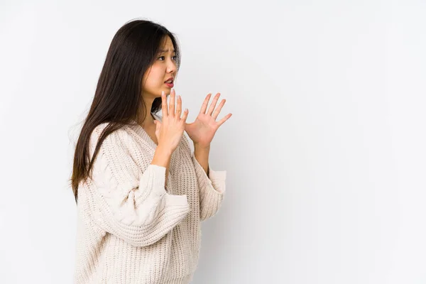 Young Chinese Woman Isolated Shouts Loud Keeps Eyes Opened Hands — Stock Photo, Image