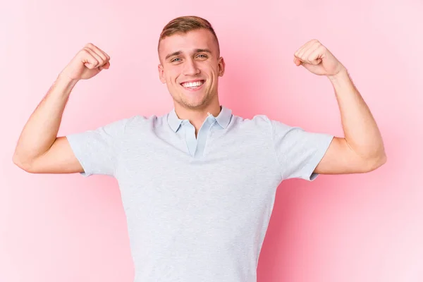 Young Caucasian Man Isolated Showing Strength Gesture Arms Symbol Feminine — 스톡 사진