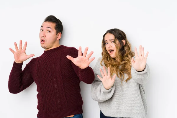 Young Couple Posing White Background Being Shocked Due Imminent Danger — 스톡 사진