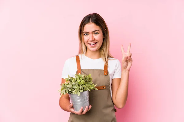 Young Caucasian Gardener Woman Pink Background Showing Number Two Fingers — 스톡 사진