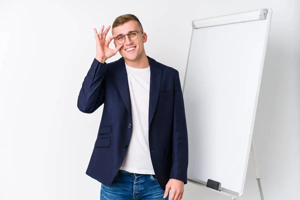 Young Coaching Man Showing White Board Excited Keeping Gesture Eye — Stock Photo, Image