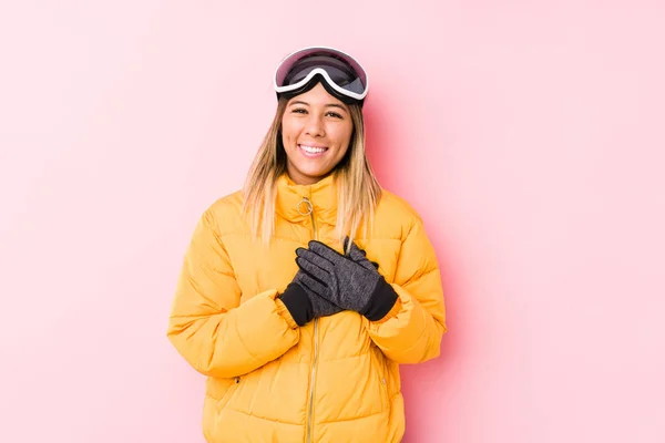 Young Caucasian Woman Wearing Ski Clothes Pink Background Has Friendly — 스톡 사진