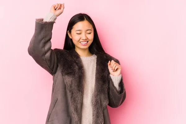 Young Chinese Woman Wearing Coat Isolated Celebrating Special Day Jumps — 스톡 사진