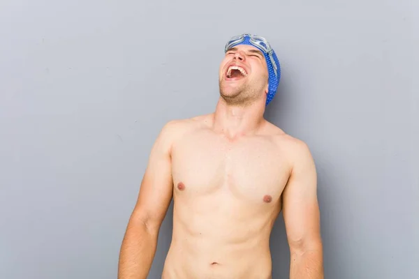 Young Professional Swimmer Man Relaxed Happy Laughing Neck Stretched Showing — Stock Photo, Image