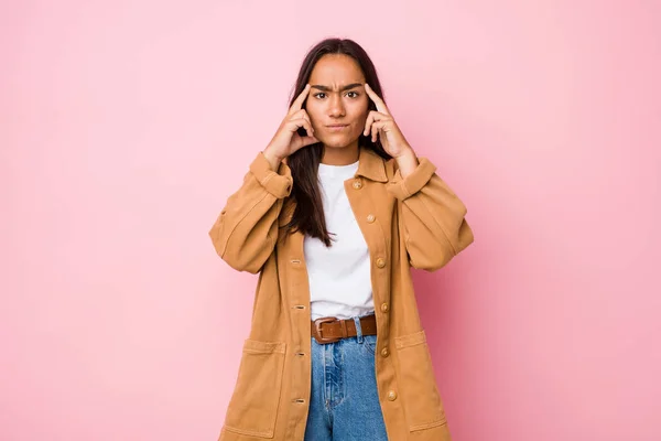 Young Mixed Race Indian Woman Isolated Focused Task Keeping Forefingers — Stock Photo, Image