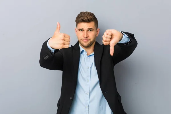 Young Handsome Caucasian Man Showing Thumbs Thumbs Difficult Choose Concept — ストック写真