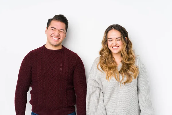Young Couple Posing White Background Laughs Closes Eyes Feels Relaxed — 스톡 사진