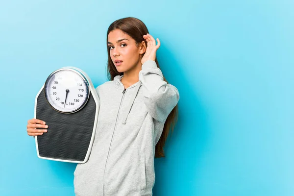 Young Fitness Woman Holding Scale Trying Listening Gossip — Stock Photo, Image