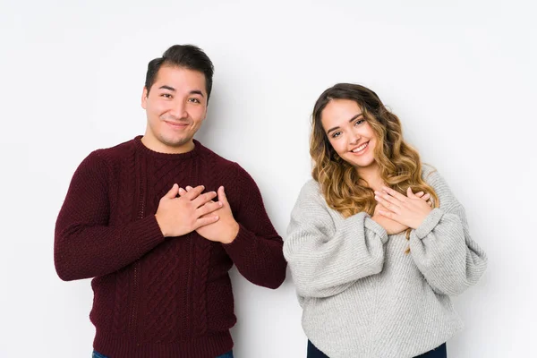 Young Couple Posing White Background Has Friendly Expression Pressing Palm — 스톡 사진